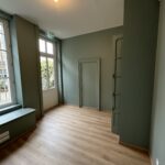 Transformation d’un appartement en bureaux à Troyes (10) - grand espace pour bureaux parquet massif et peinture verte