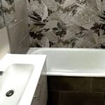 Rénovation d'un appartement au Chesnay (78) - salle de bain rénovée avec baignoire