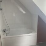 Rénovation complète d’une maison à Saint-Nolff (56) - salle de bain après travaux avec baignoire