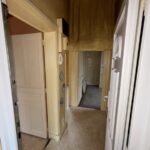 rénovation d'un appartement à Clermont Ferrand : couloir avant travaux